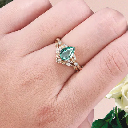Pear cut Tsavorite engagement ring set rose gold pear cut tsavorite  ring unique moissanite wedding band marquise moissanite band stack set